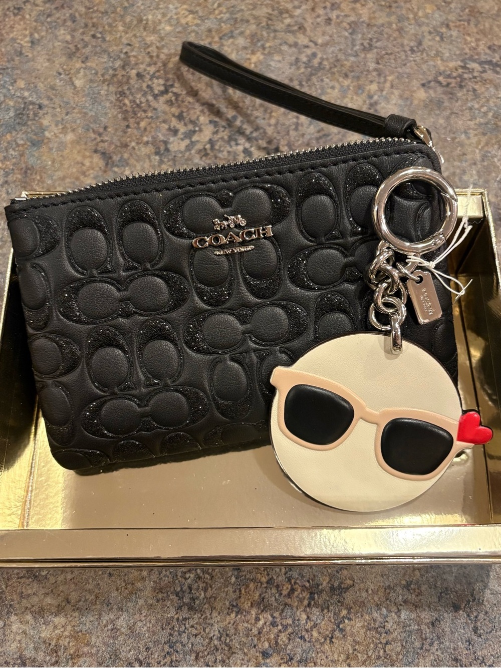 Coach wristlet with charm keychain
